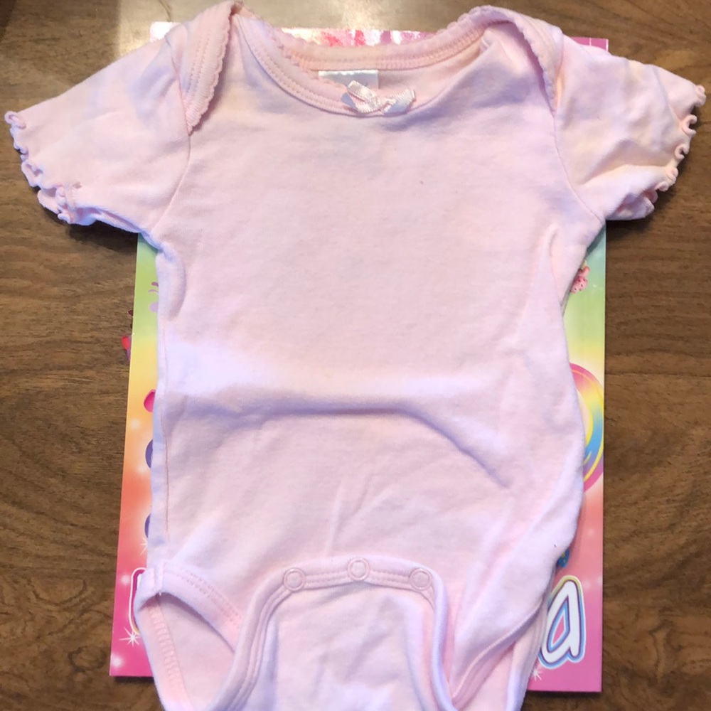 Pink ruffle sleeve onesie